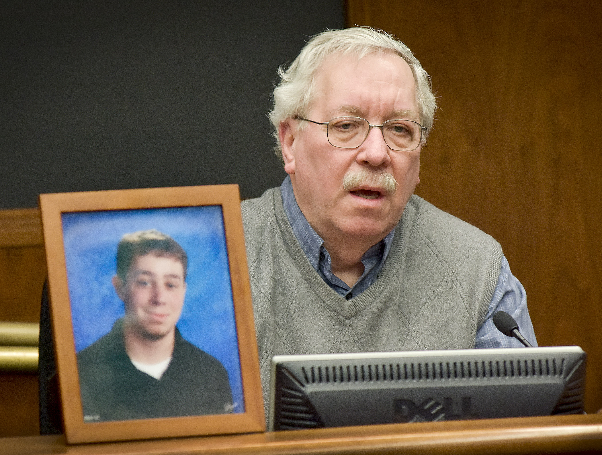 John Dudley, whose son, Andrew, was killed by a distracted driver, testifies before the House Transportation and Regional Governance Policy Committee in support of a bill that would mandate hands free cell phone use while driving. Photo by Andrew VonBank